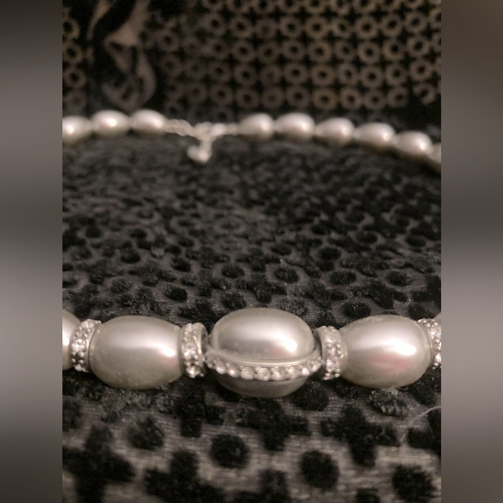 Lovely silver beaded necklace. Crystal accents on some of the beads.